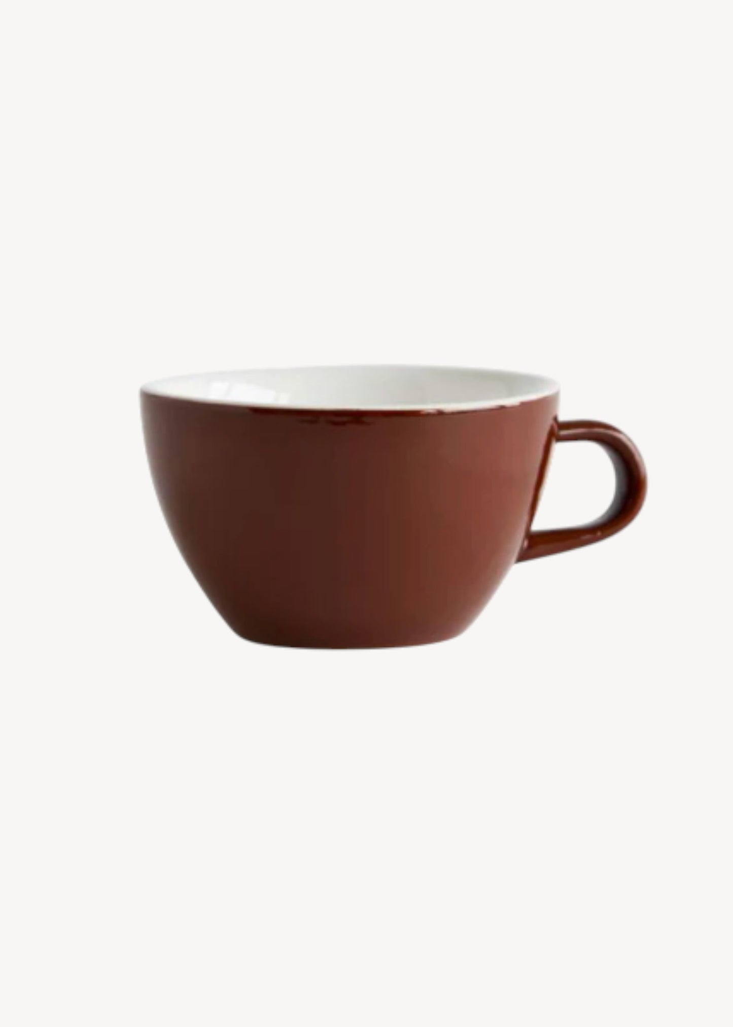 Brown mug with white interior on a white background