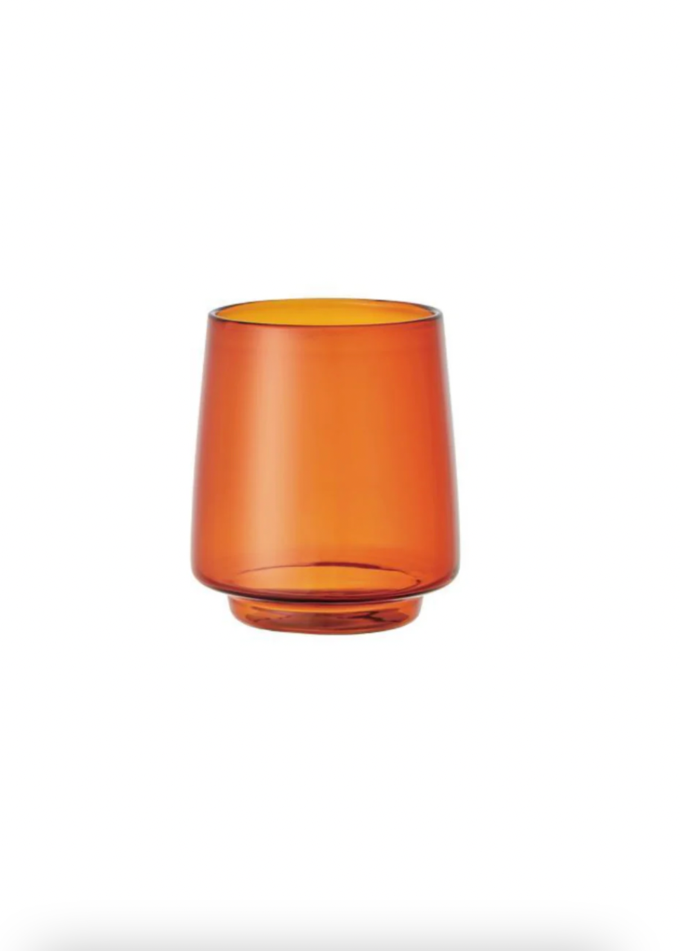 Amber glass tumbler on a white background