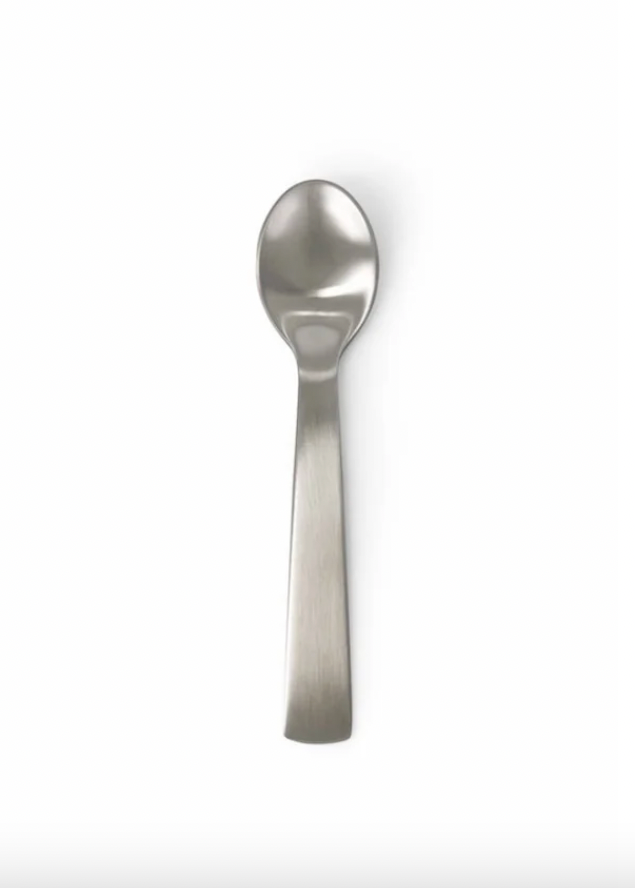 Silver spoon on a white background
