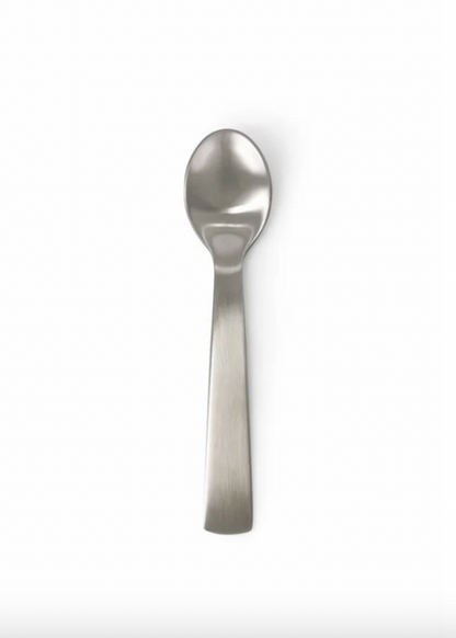 Silver spoon on a white background