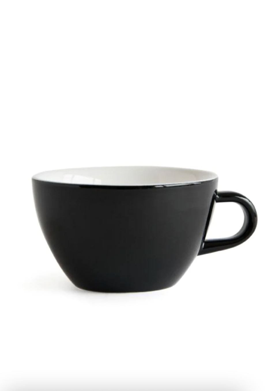 Black ceramic cup with white interior on a white background