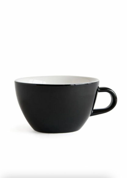 Black ceramic cup with white interior on a white background