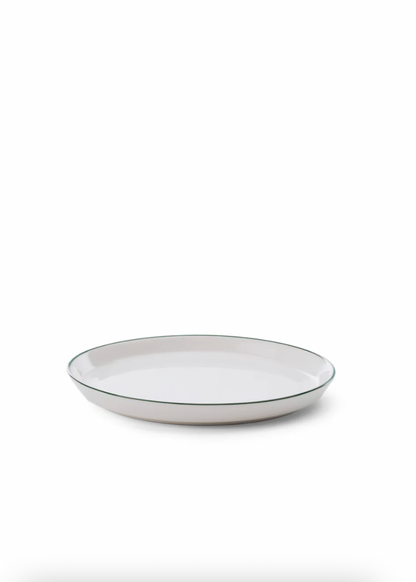 White ceramic bowl with a thin black rim on a white background