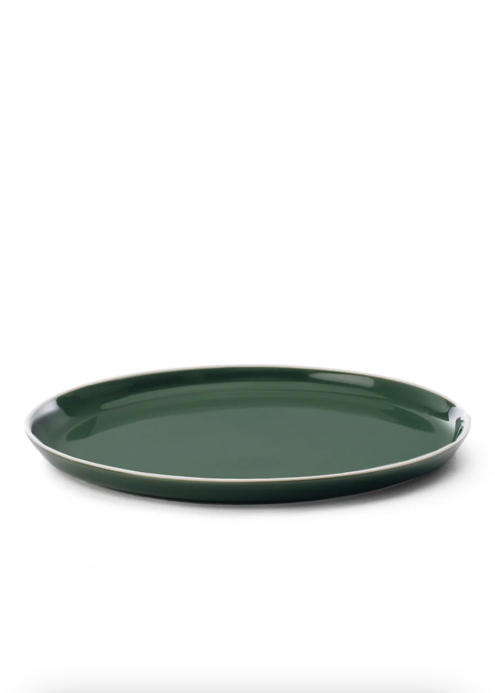 Green ceramic plate on a white background