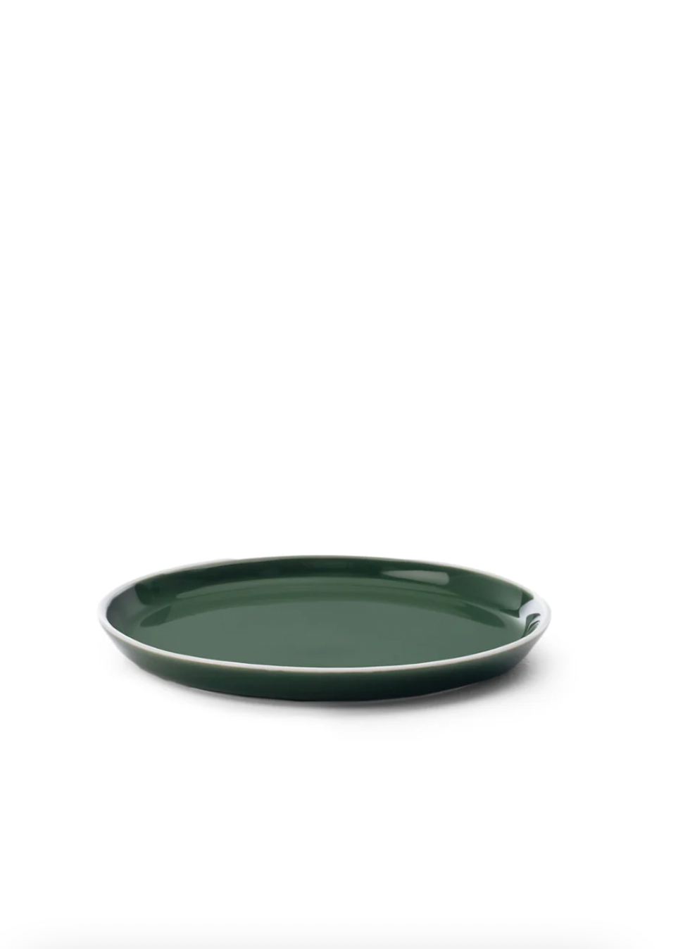 Green ceramic plate on a white background
