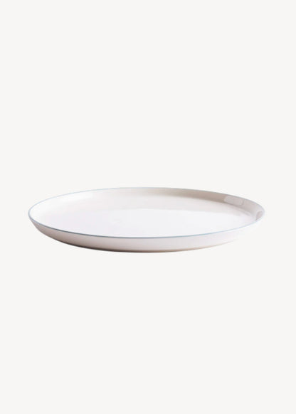 White ceramic plate on a white background