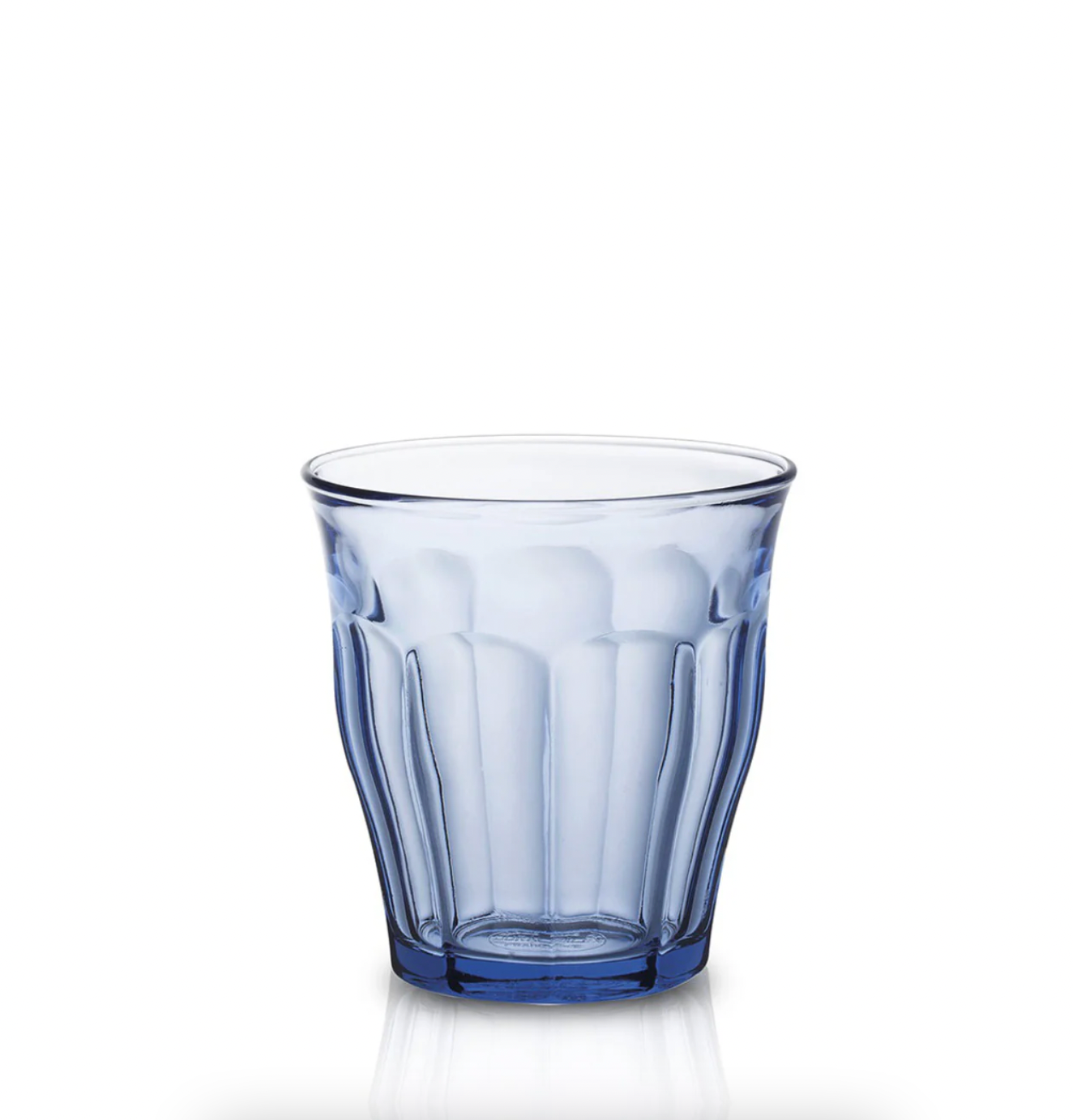 Blue glass tumbler on a white background