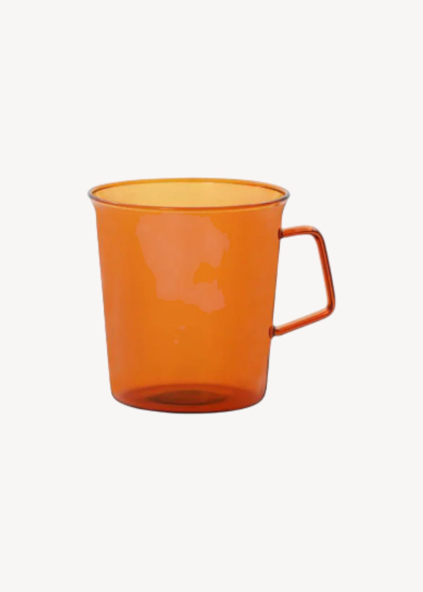 Orange mug on a white background