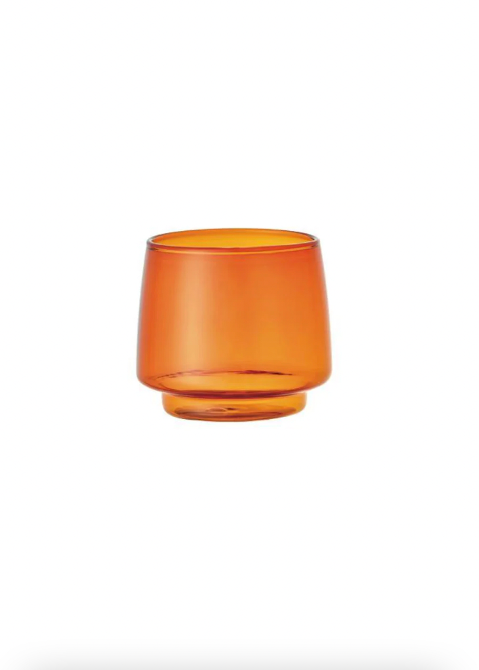 Amber glass cup on a white background