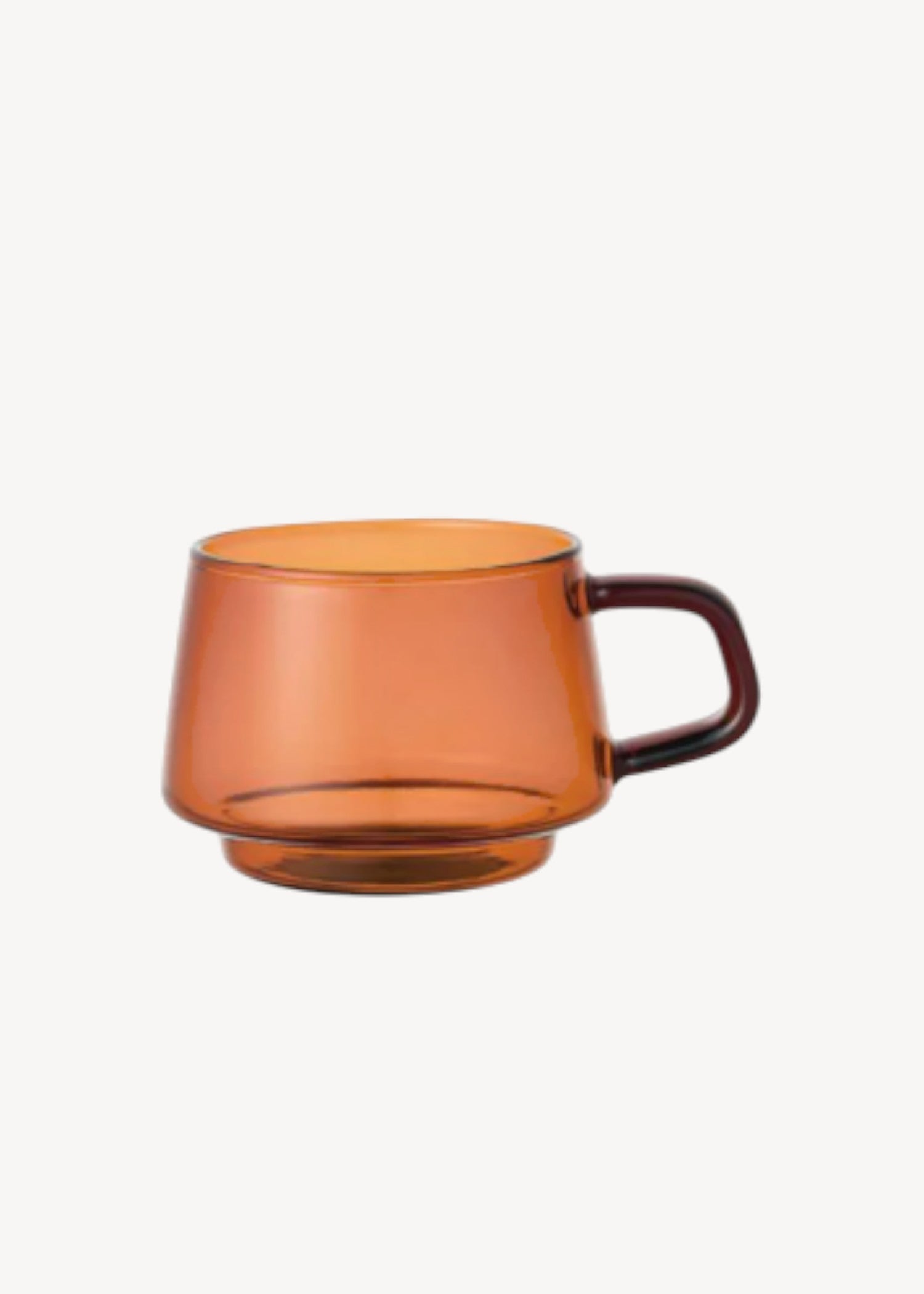 Orange mug with a brown handle on a white background