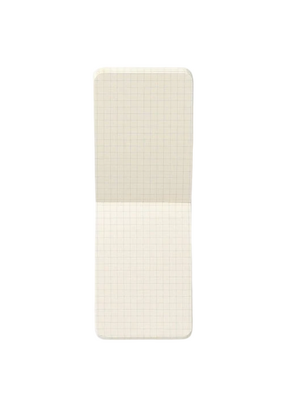 Open gridded notebook on a white background