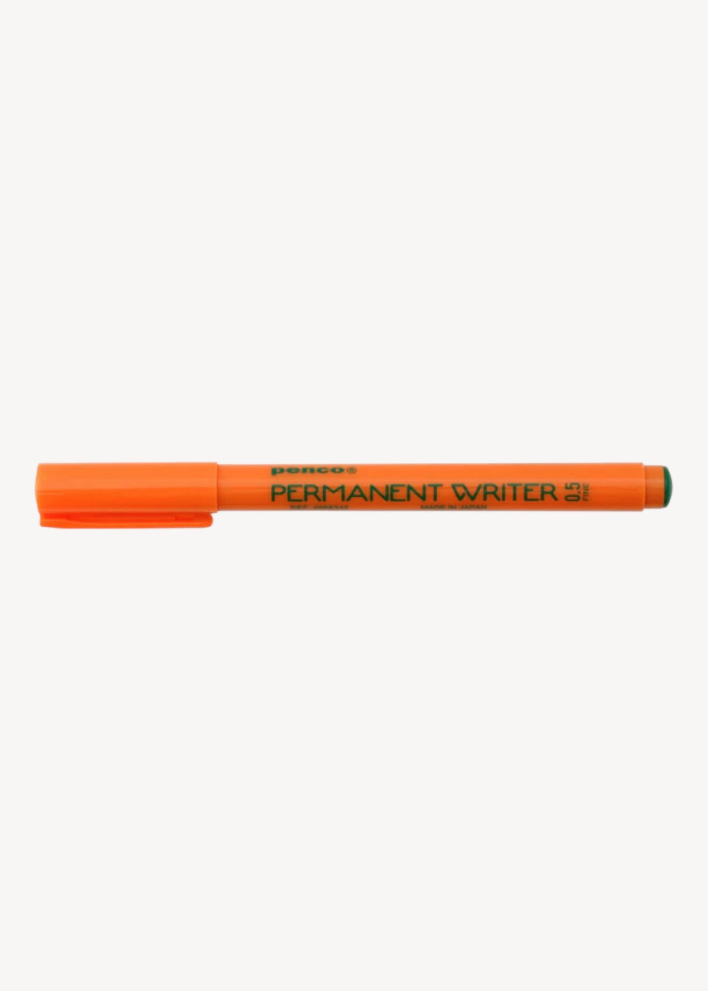 Orange permanent marker on a white background