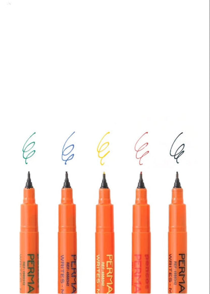 Set of orange markers with colored lines on a white background