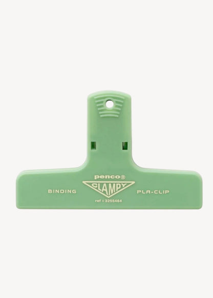 Light green binding clamp with 'Penco' branding on a white background