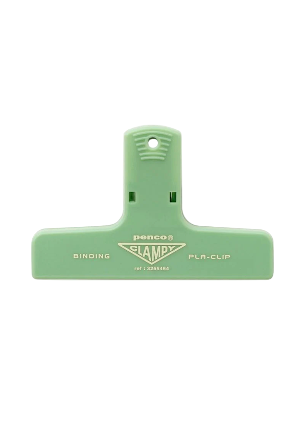 Green binding clip with 'Penco' branding on a white background
