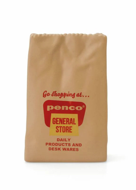 Brown paper bag with red and yellow text on a white background