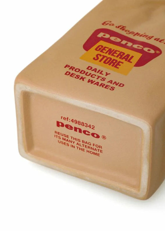 Brown paper bag with Penco branding on a white background