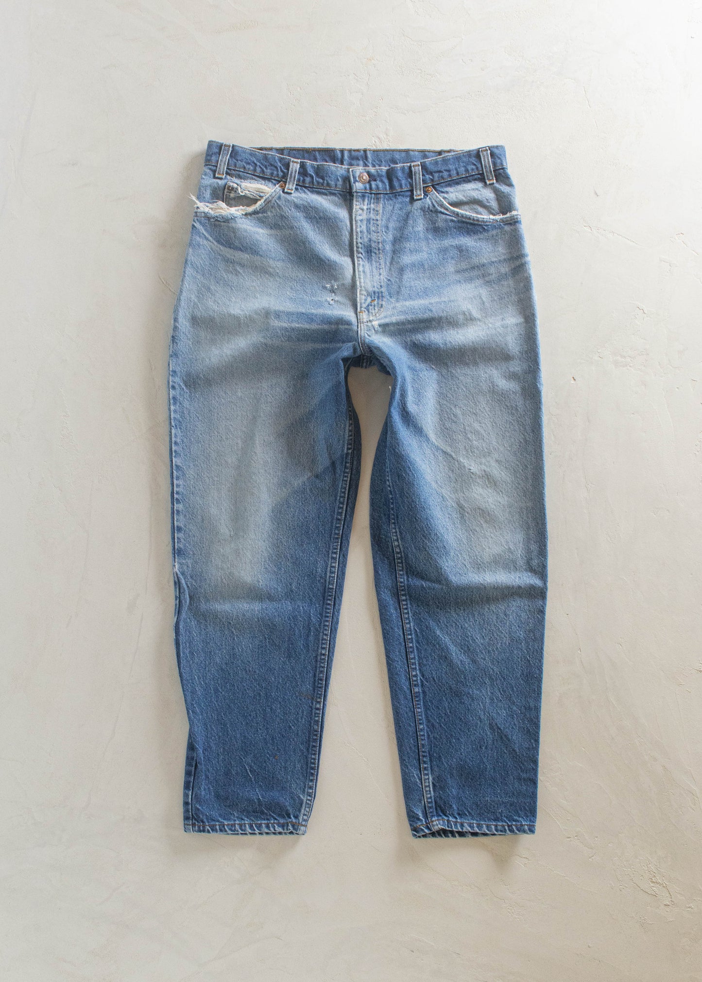 1980s Levi's 550 Orange Tab Midwash Jeans Size Women's 33 Men's 36